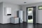 The picture shows a Vitocal 250-S split air source heat pump in hybrid mode.